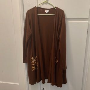 LuLaRoe Caroline brown with animal print pockets